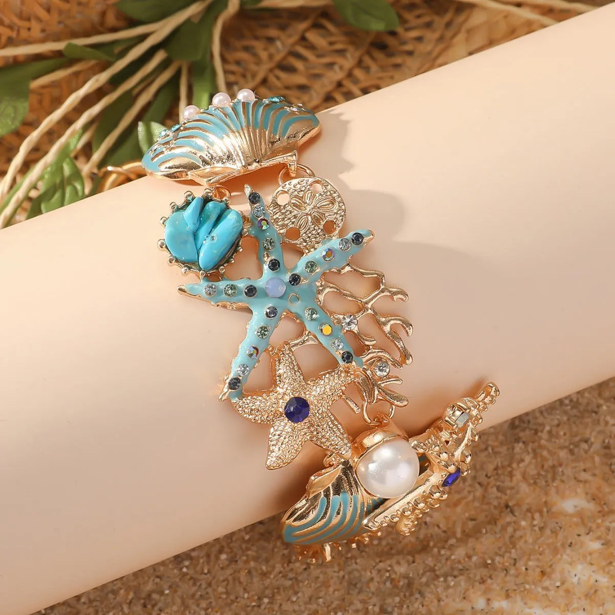 Women's marine boat anchor and starfish alloy bracelet in turquoise, coral red or coral blue colour