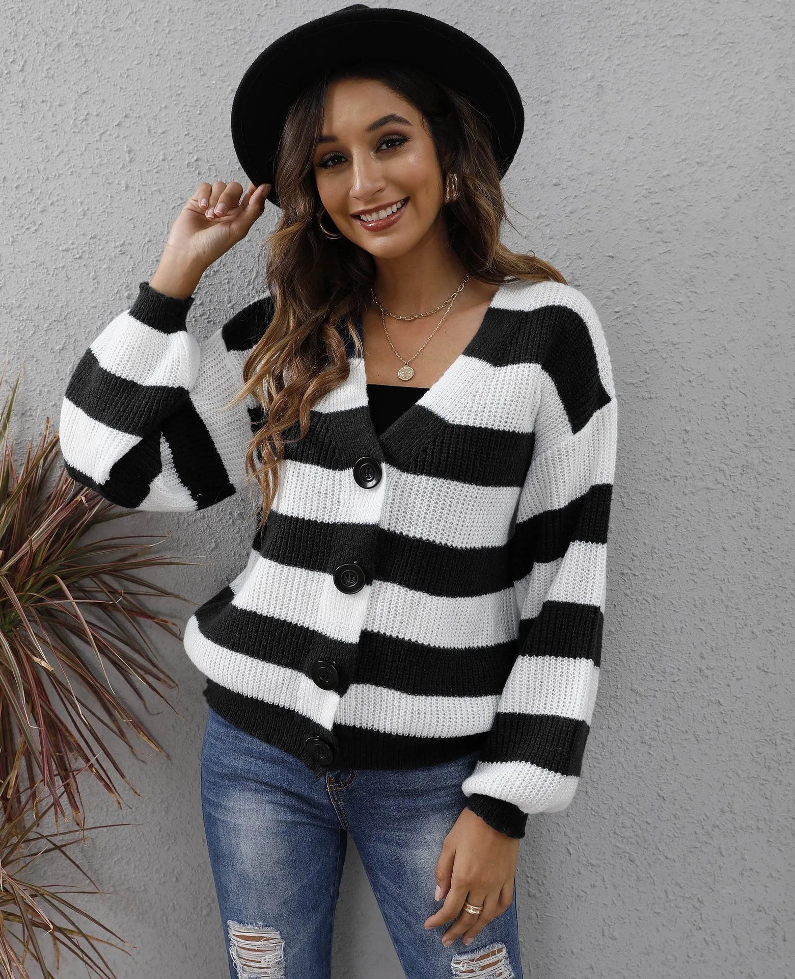 Women's striped cardigan sweater in deer plush fabric with button stitching detail