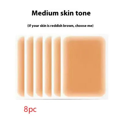 Pack of adhesive tattoo cover patches in various skin tone colours on a white background.