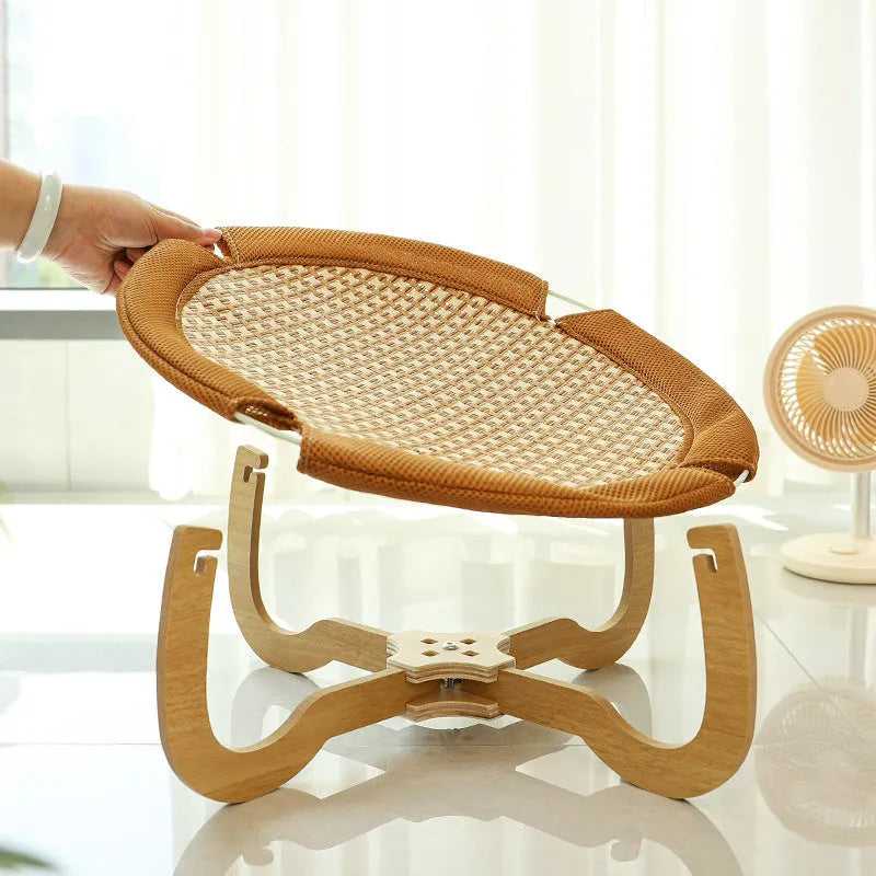 Brown woven rattan pet hammock measuring 46cm square with 17.5cm elevation
