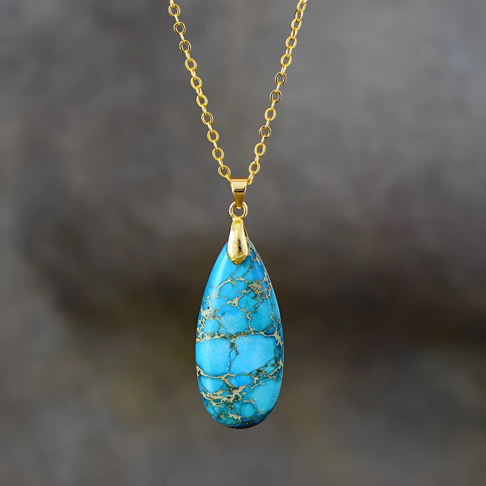 Emperor Stone jade water drop pendant on an 18K gold-plated chain, showing colour options.