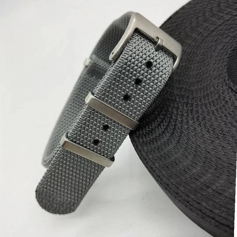 Woven nylon integrated watch strap in Army Green colour, showing 20mm and 22mm width options.