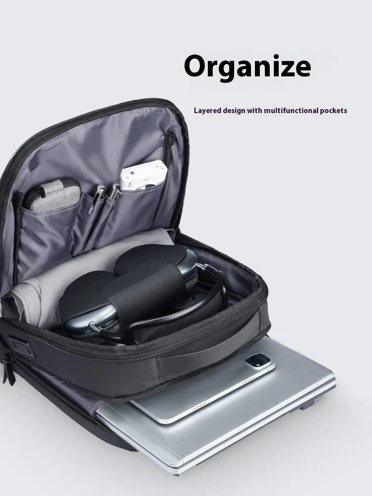 Graphite grey USB business backpack with charging port and below 20L capacity
