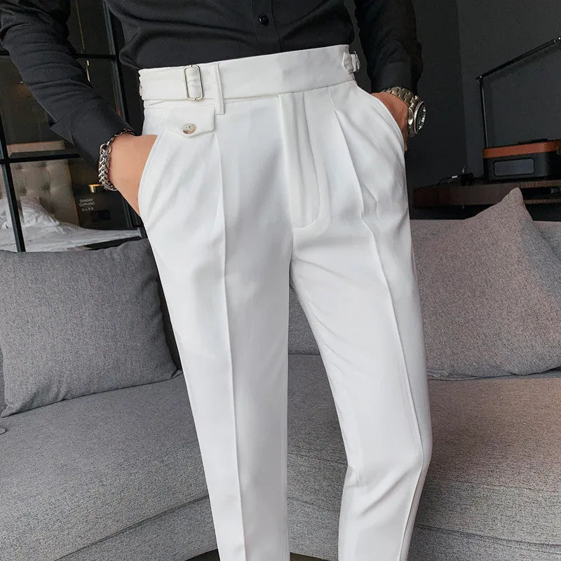Straight leg casual trousers in solid colours on a hanger.
