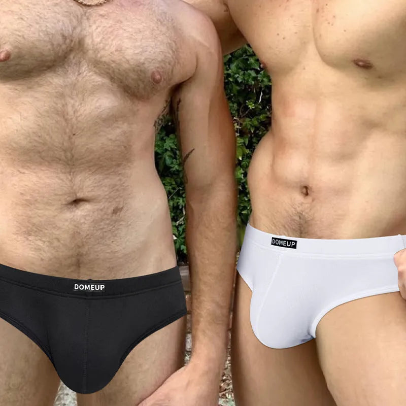 Men's seamless polyester briefs in white, black and pink with low waist design