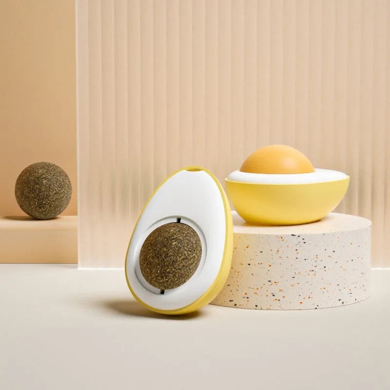 Catnip ball toy in fried egg and poached egg shapes with adhesive backing for wall mounting