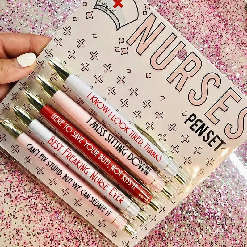 Five nurse-themed ballpoint pens with humorous medical copywriting on plastic barrels