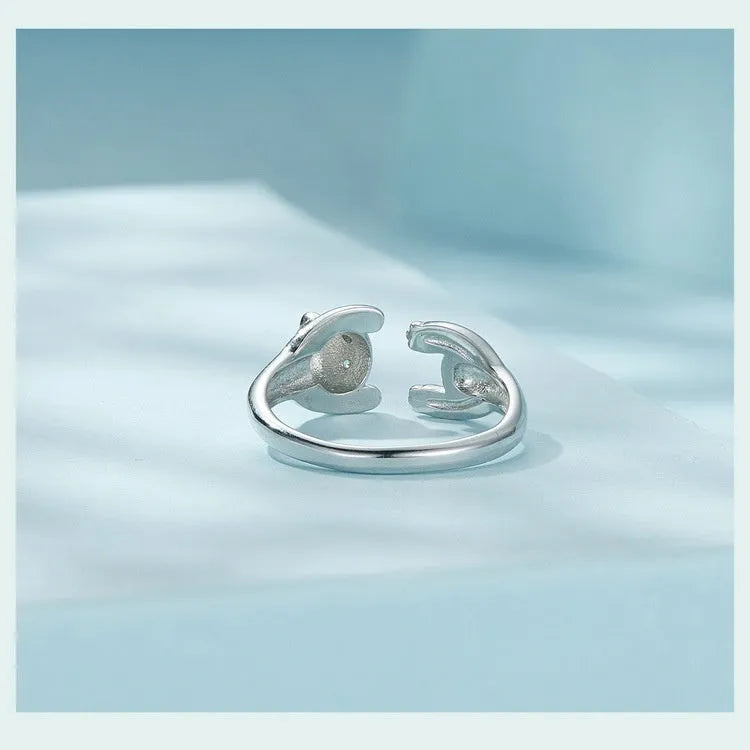 Adjustable sterling silver panda open ring bracelet with white gold plating.