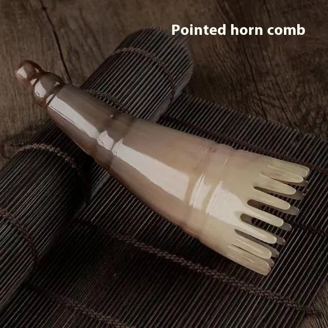 White buffalo horn comb with half-wide teeth and pointed tips for shampoo distribution and scalp massage