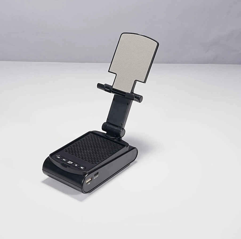 Multi-function lazy phone holder with Bluetooth speaker USB powered black white plastic