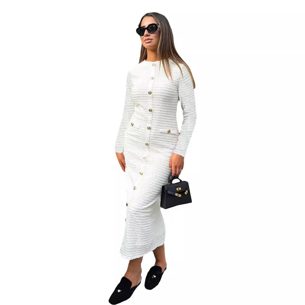 French retro slim fit knitted long-sleeved pullover dress in black with button accents and a one-step skirt.