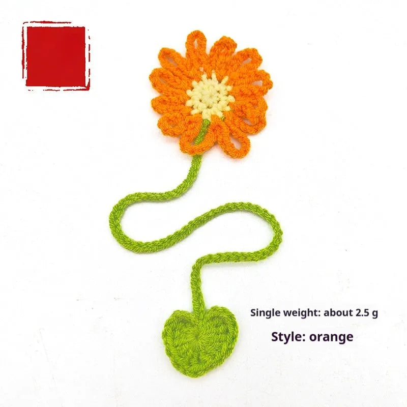 Hand-crocheted wool daisy bookmark with flexible wire core in multiple colour options