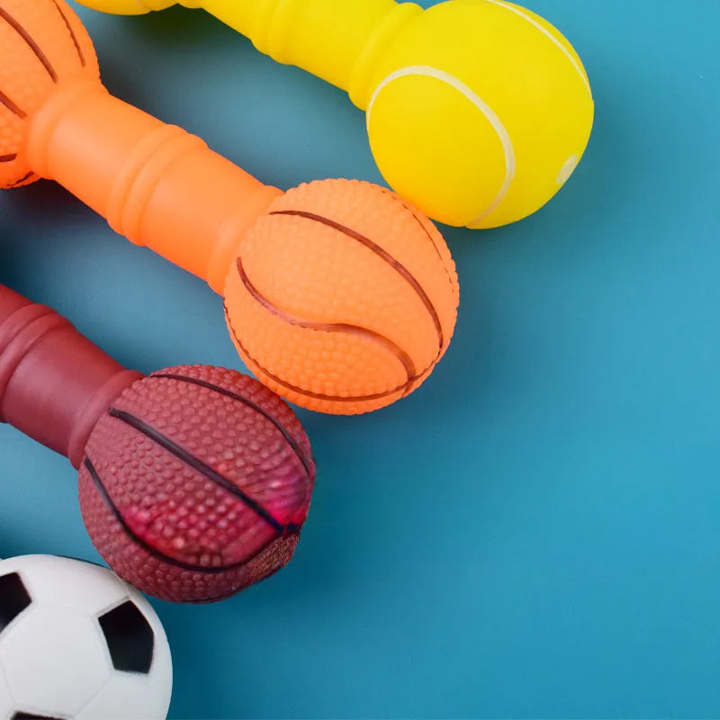Brown PVC dog chew toy shaped like a dumbbell with football ends on a white background.