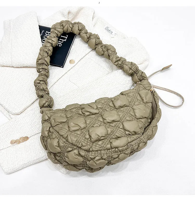 Women's nylon shoulder messenger bag in beige colour showing dimensions and adjustable strap