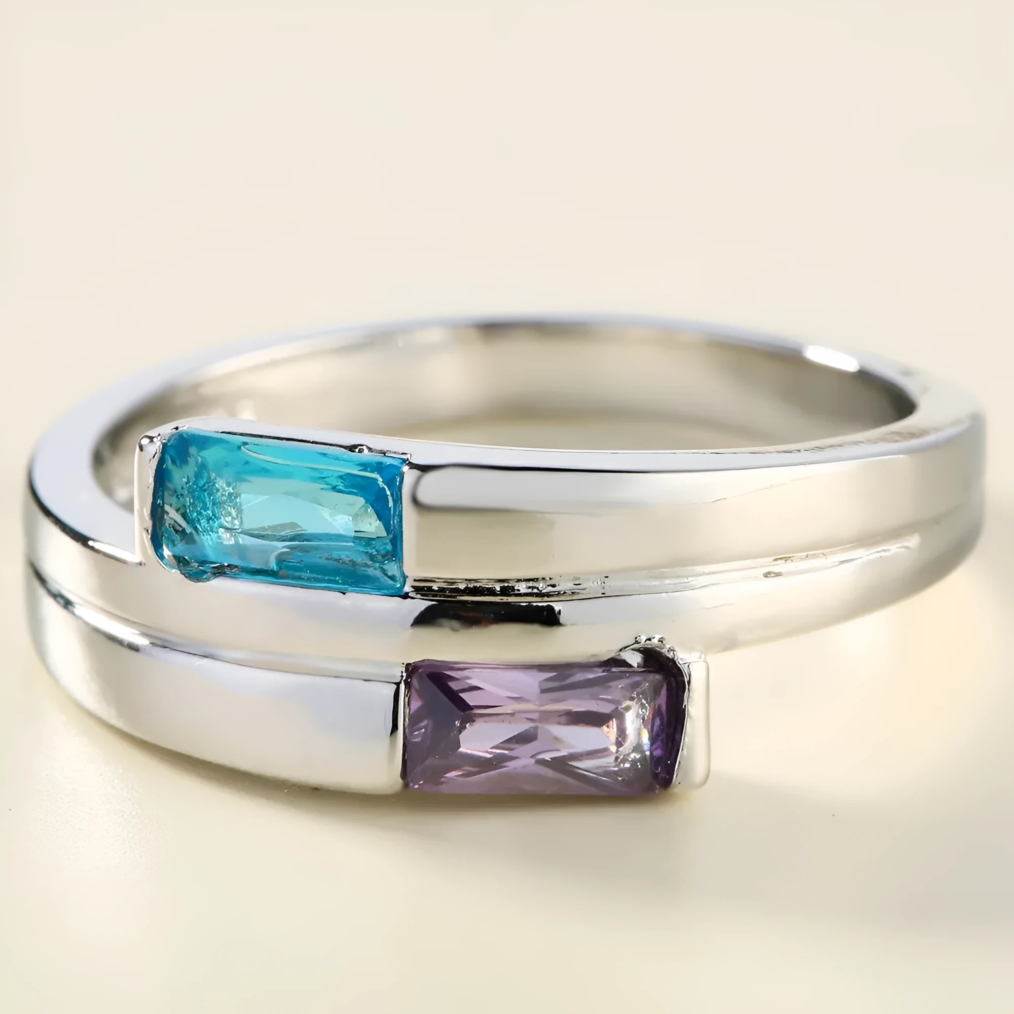 Silver-coloured copper ring with a zircon stone inlay, shown in ins style.