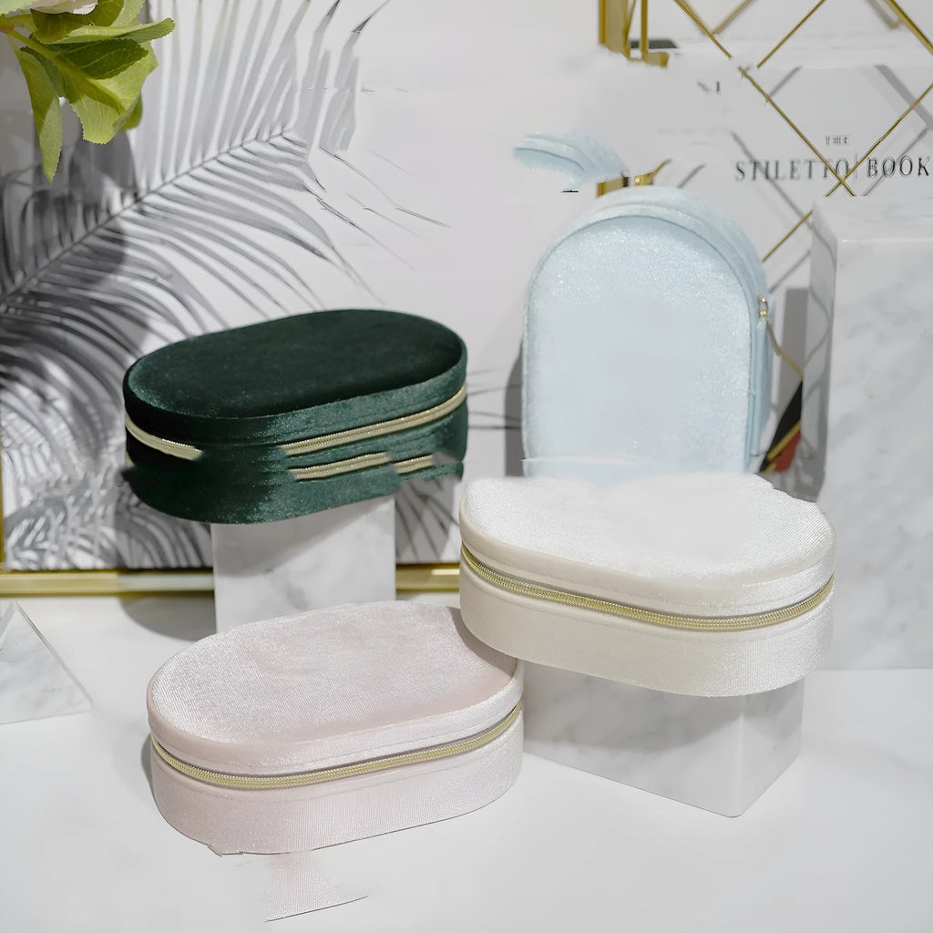 Oval velvet jewellery storage box in multiple colours with flannel lining for rings and earrings