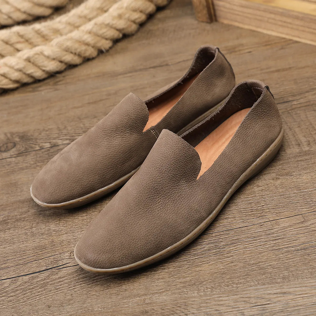 Handmade low-top men's shoes in khaki with a wedge flat heel and rubber sole.