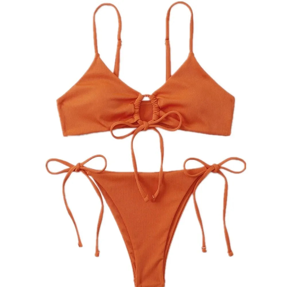Women's solid colour drawstring bikini swimsuit in quick-dry nylon on a mannequin.
