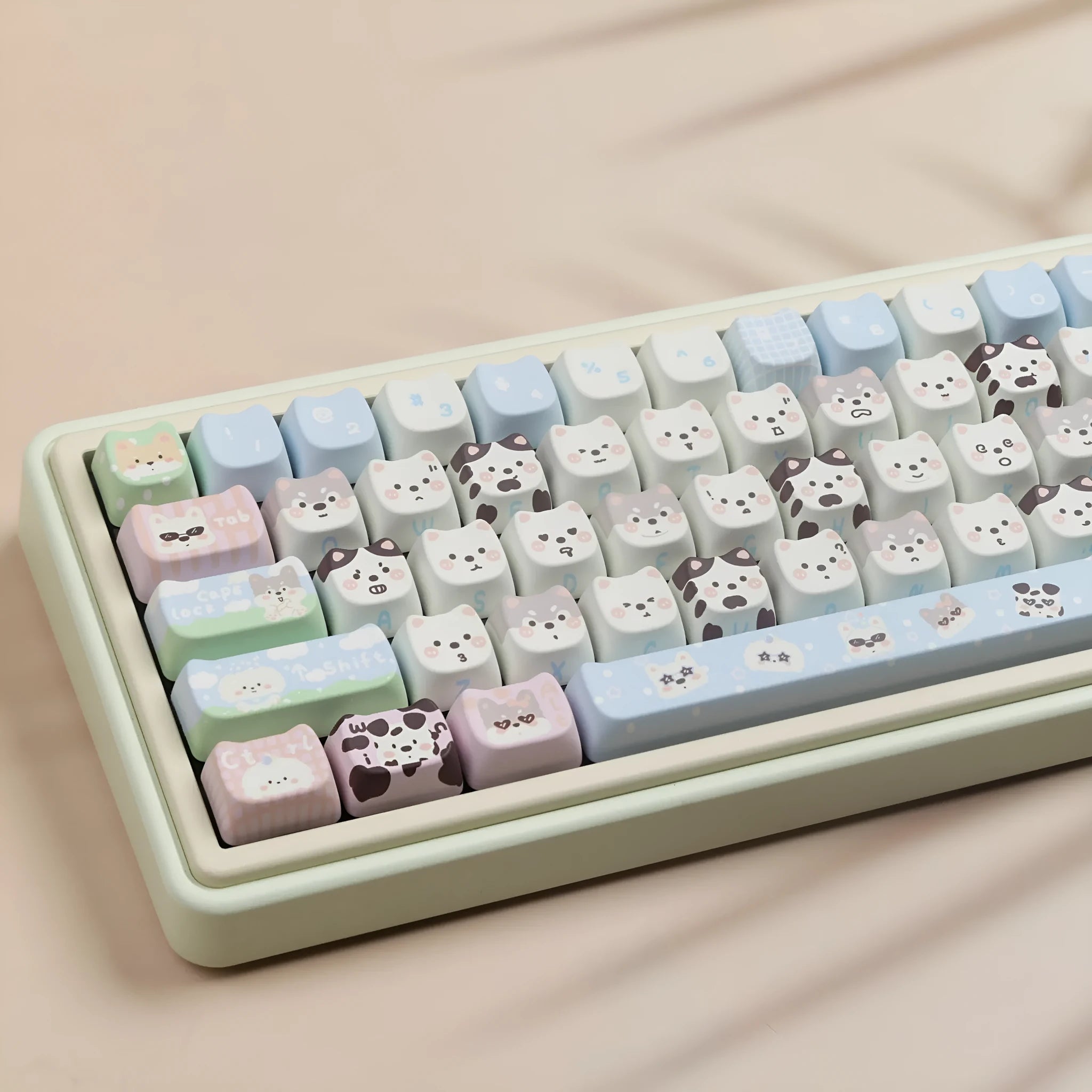PBT sublimation key cap set showing colourful cat and puppy character designs on mechanical keyboard keys