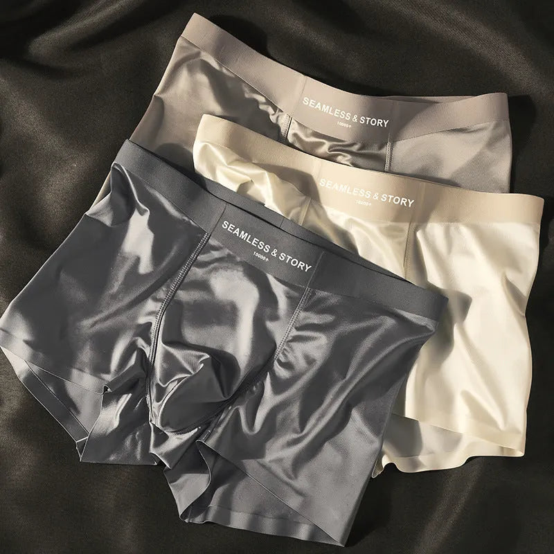 Men's ice silk underwear set in a solid colour showing mid-waist traceless design.