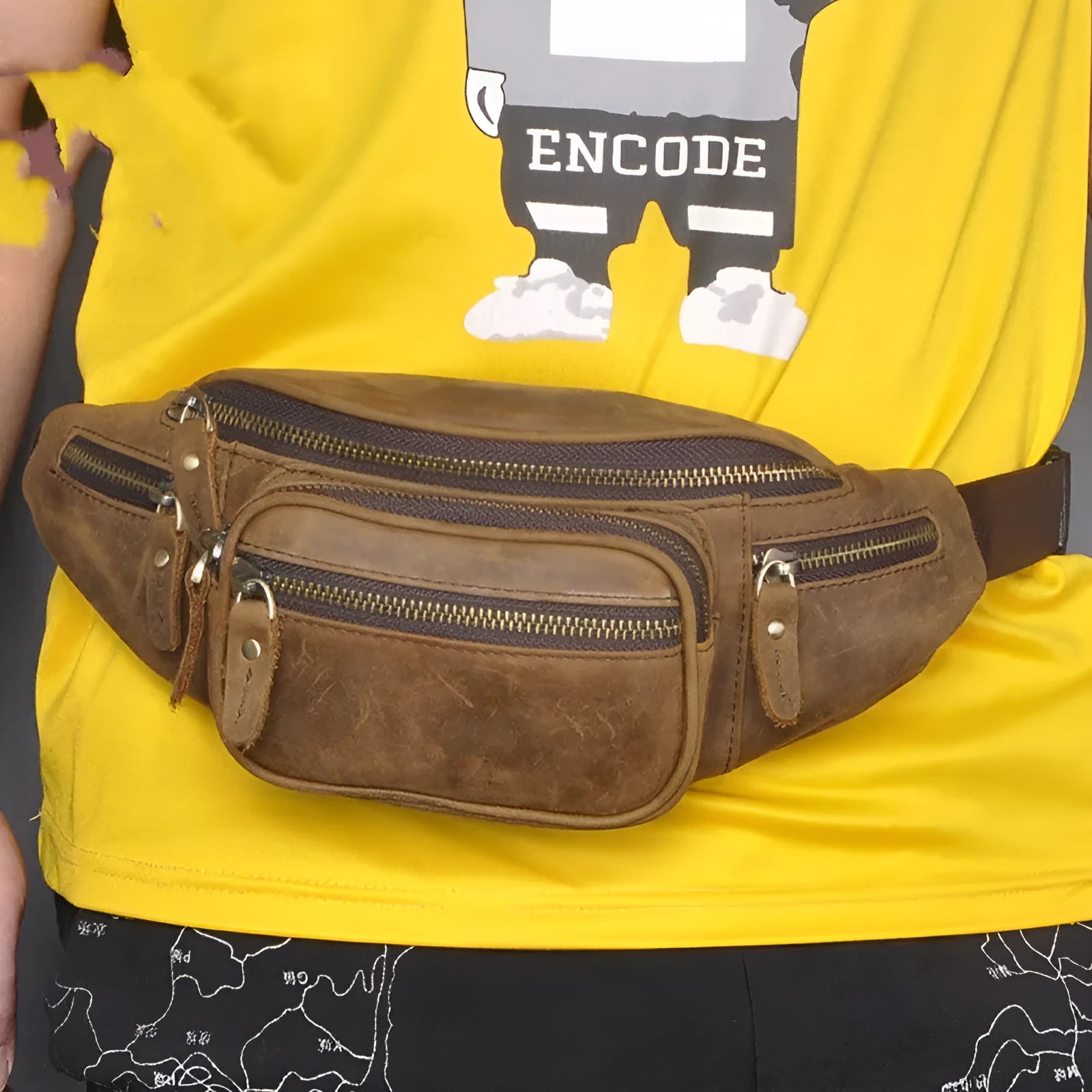 Dark crazy horse cowhide leather messenger bag showing front flap and adjustable shoulder strap.