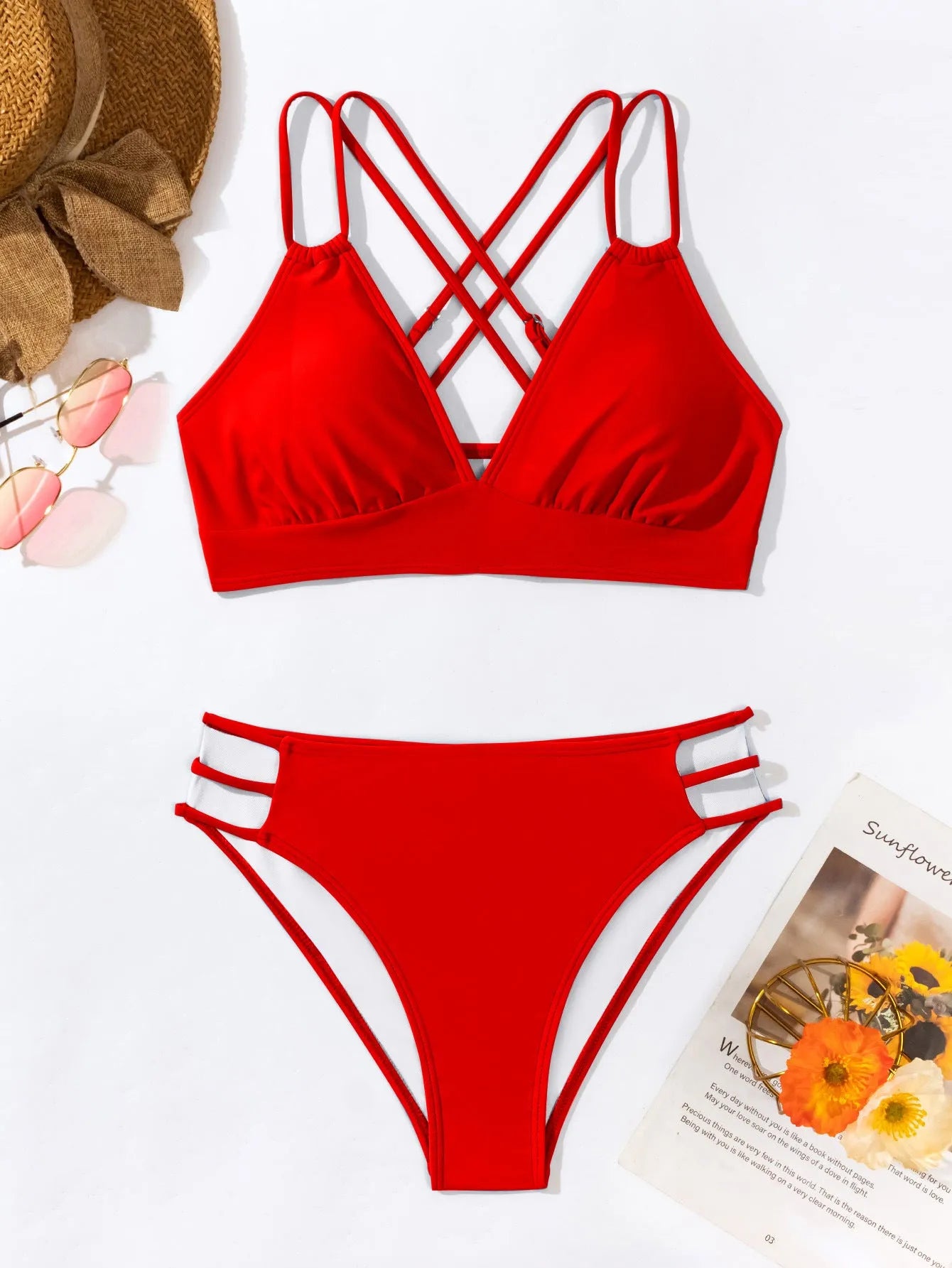 Women's black halter neck bikini swimsuit with V-neck top and split shorts on mannequin