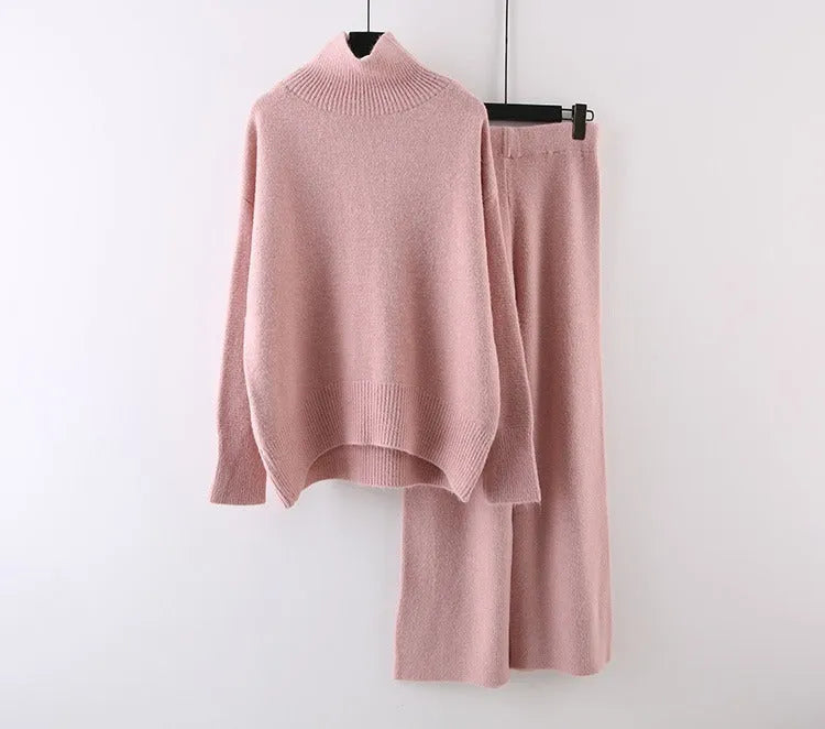 Women's casual two-piece set featuring a long sleeve sweater and wide leg trousers in a solid colour.