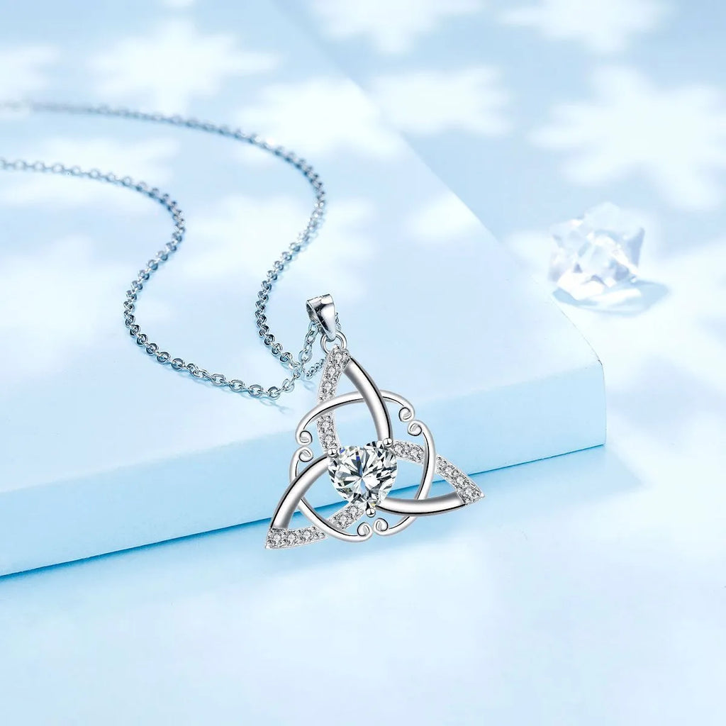 Geometric Celtic knot pendant necklace for women in electroplated copper, showing colour options.