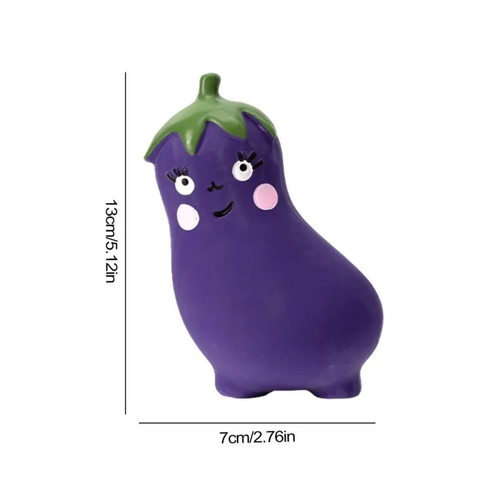 Cartoon onion and eggplant latex dog chew toy for puppies on a white background.