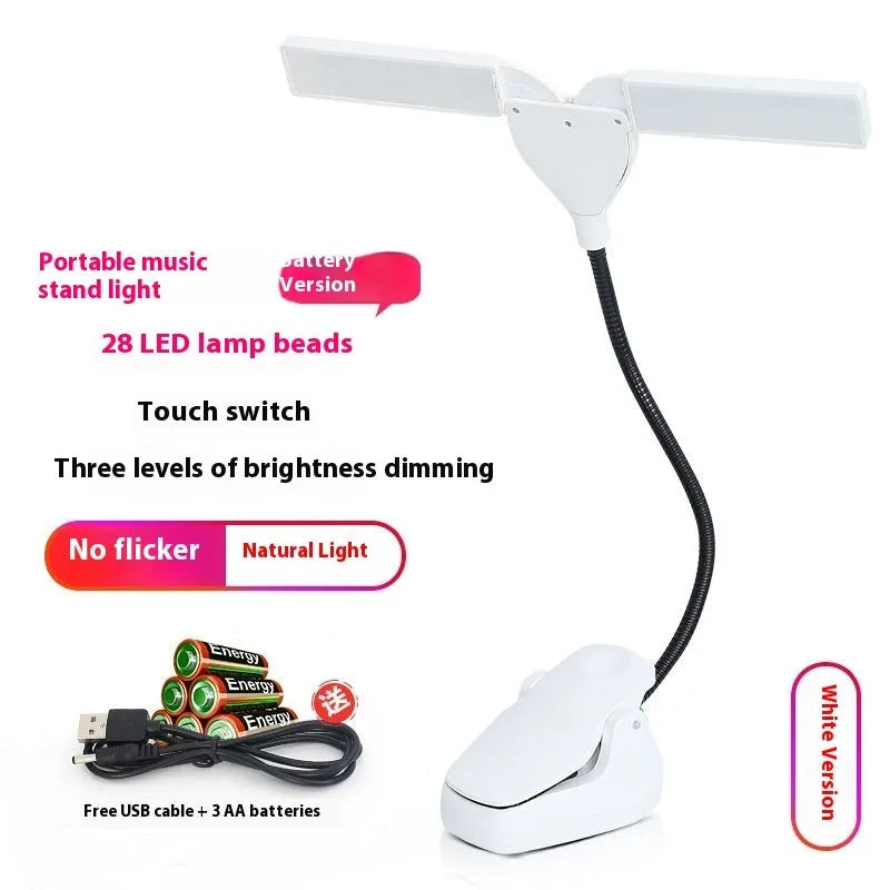 Black rechargeable music stand lamp with 28 LEDs clipped to metal music stand
