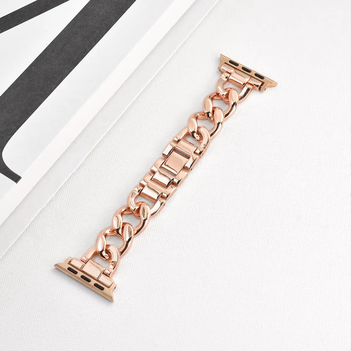Metal denim chain replacement strap for Apple Watch in silver, black, gold, rose gold, and Starlight colours.