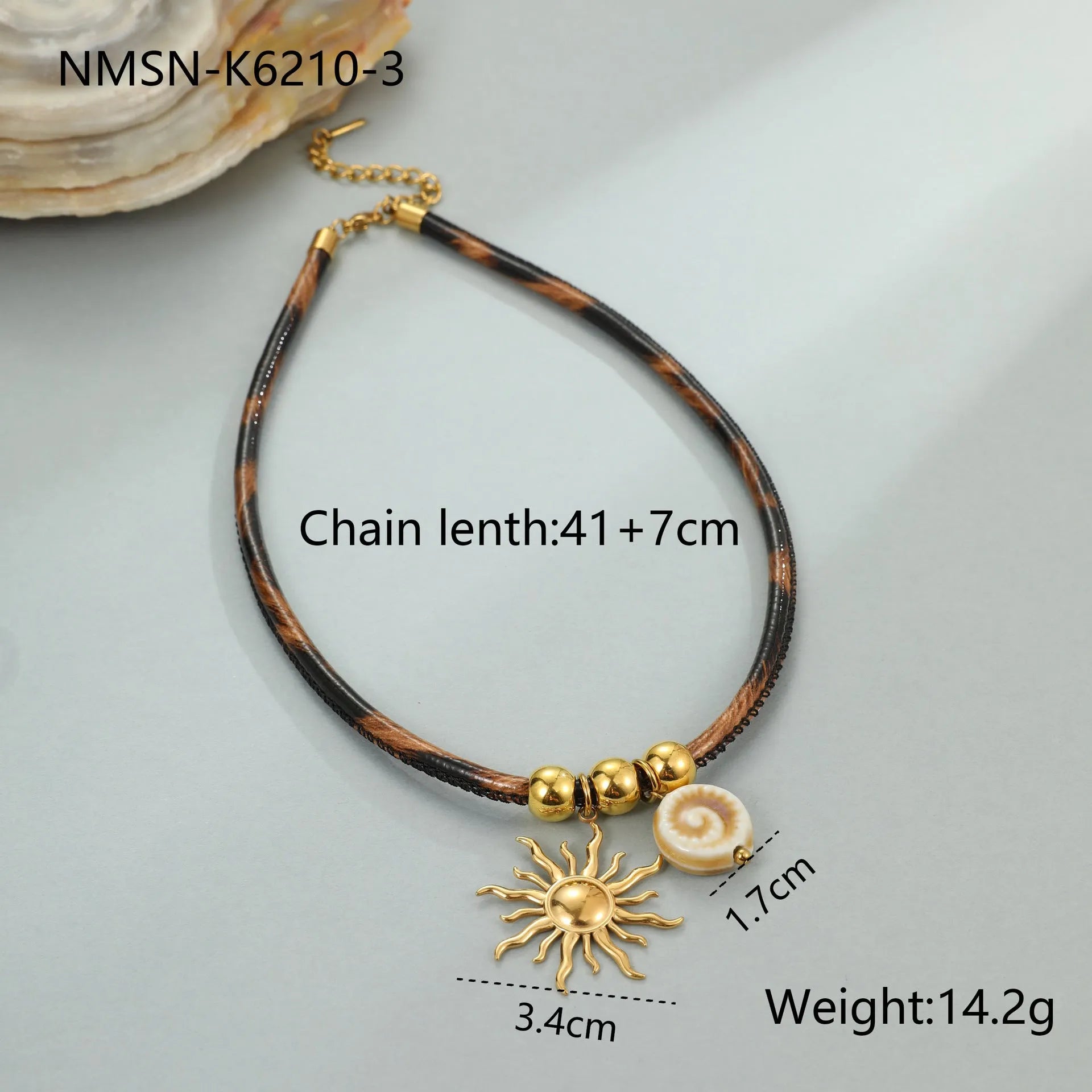 Geometric leopard print pendant on a stainless steel necklace chain with gold electroplated finish.