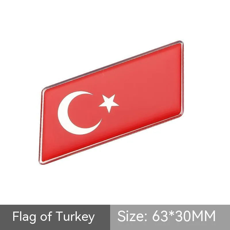 Aluminium car sticker flag emblem showing national flag design in parallelogram shape