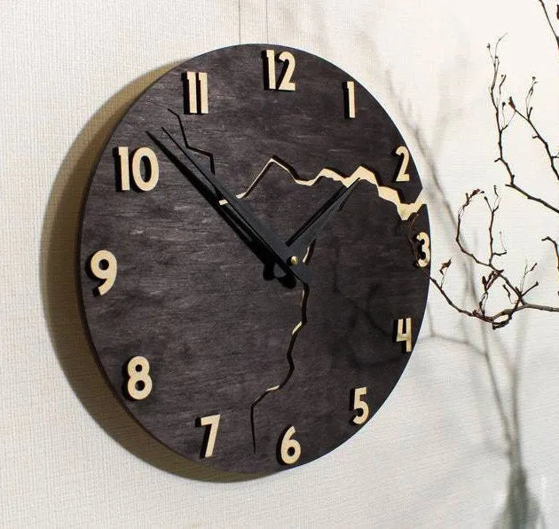Modern wooden wall clock with cracked finish and Arabic numerals in contemporary home setting
