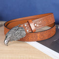 Men's black imitation leather belt with a detailed silver alloy cow head buckle and pin fastening.