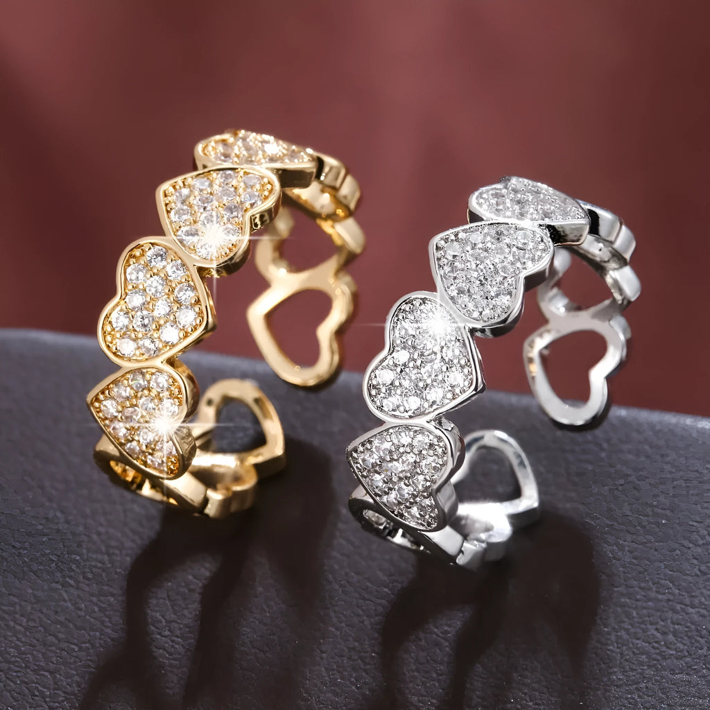 Adjustable open-ended copper couple's ring with geometric shape and heart detailing in gold or silver finish