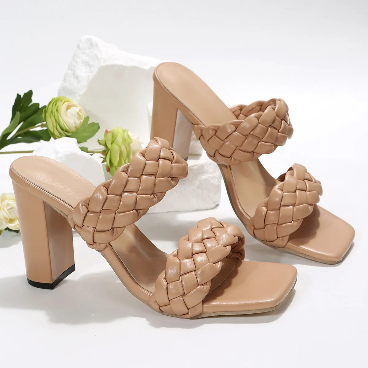Square toe flip-flops with chunky woven heel in white and apricot colours on a rubber sole.