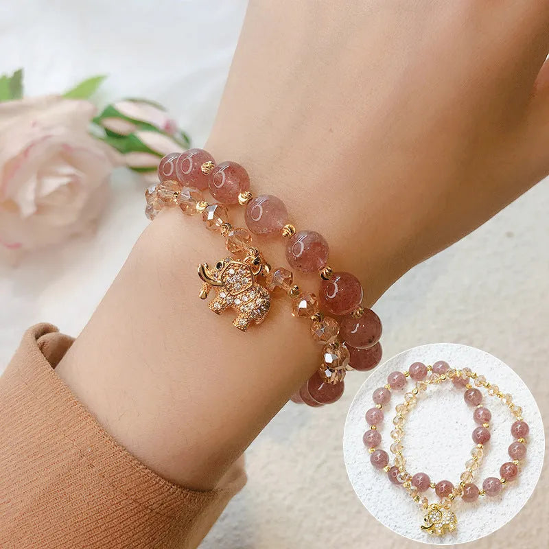 Women's retro bracelet in colour hair crystal or strawberry quartz with ethnic design elements
