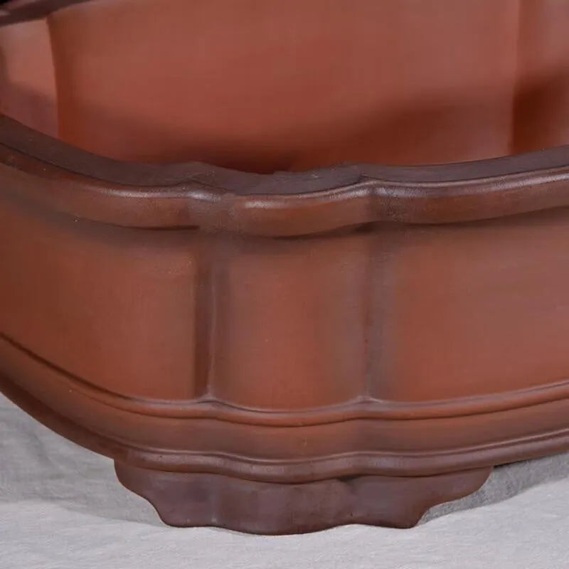 Antique jade Chinese style purple clay flowerpot with golden marble patterning, oval shape, 71cm long.