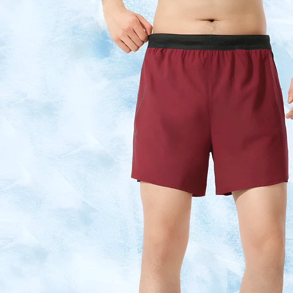 Men's solid colour low waist basketball shorts in polyester fabric shown in multiple colour options