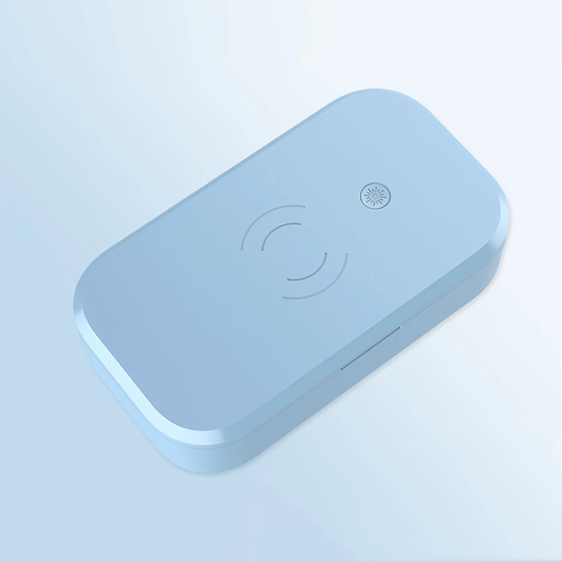 Compact white ultraviolet disinfection box with wireless charging surface for mobile phones