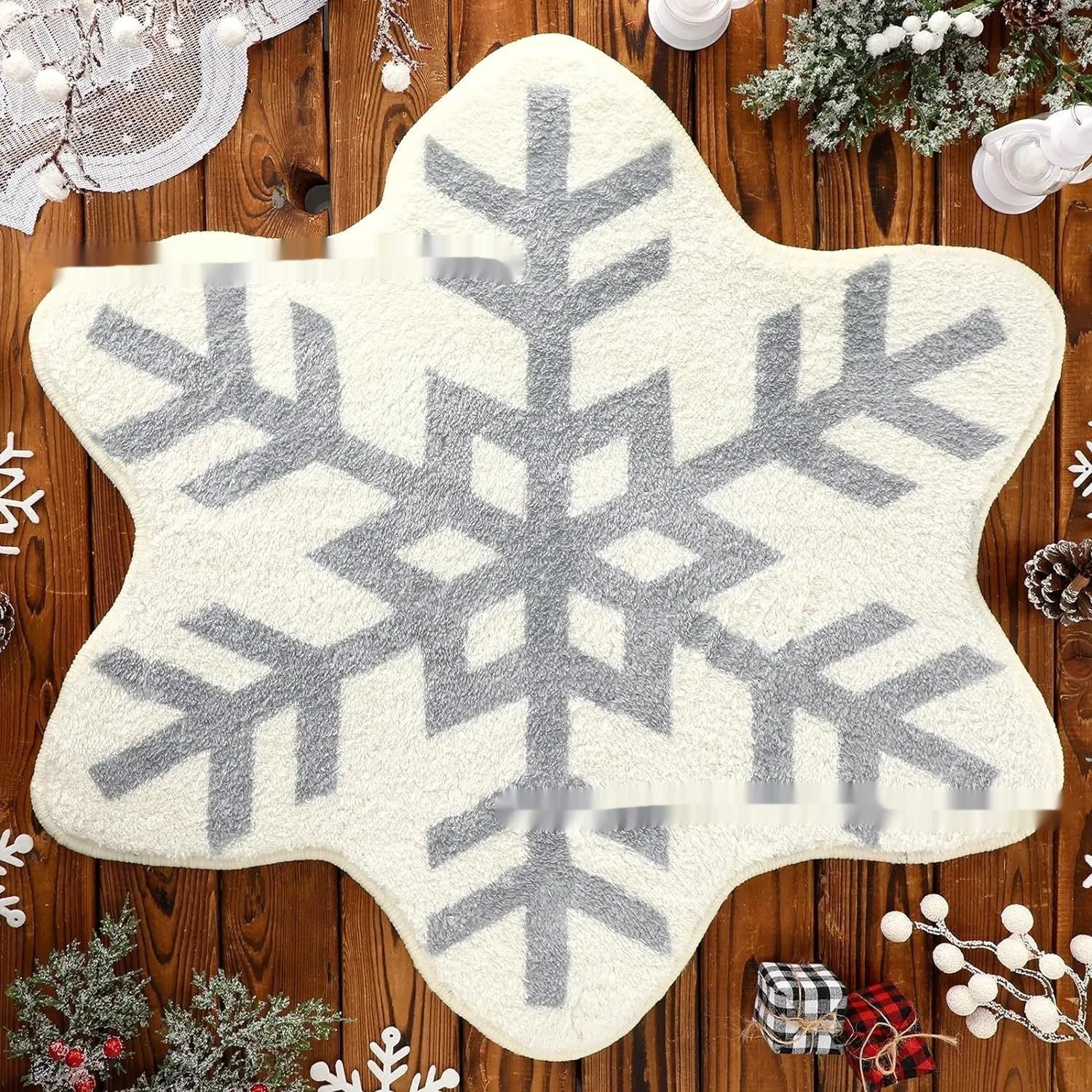 Christmas round pad polyester carpet mat in festive printed design on floor.
