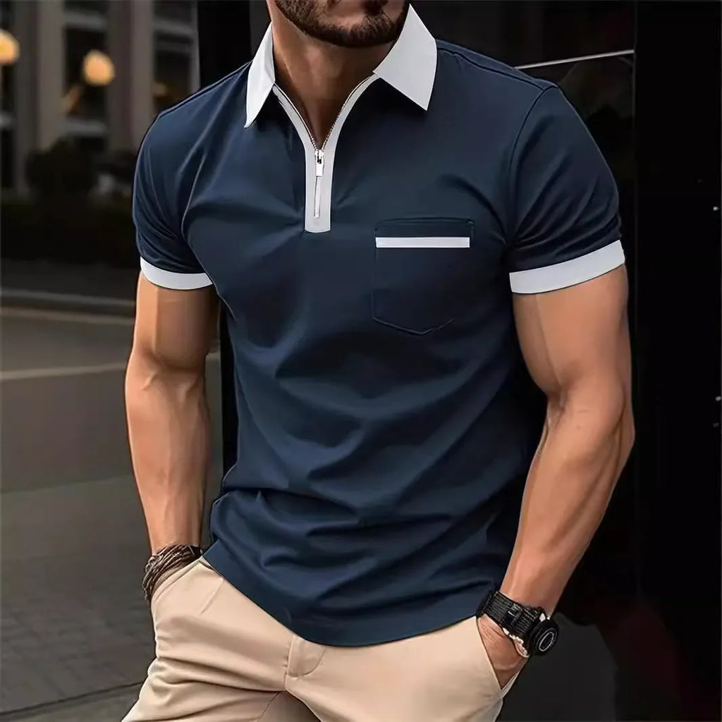 Man wearing a loose-fit casual short sleeve shirt with a chest pocket and zipper decoration.
