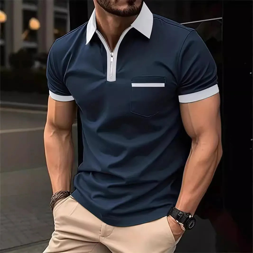 Man wearing a loose-fit casual short sleeve shirt with a chest pocket and zipper decoration.