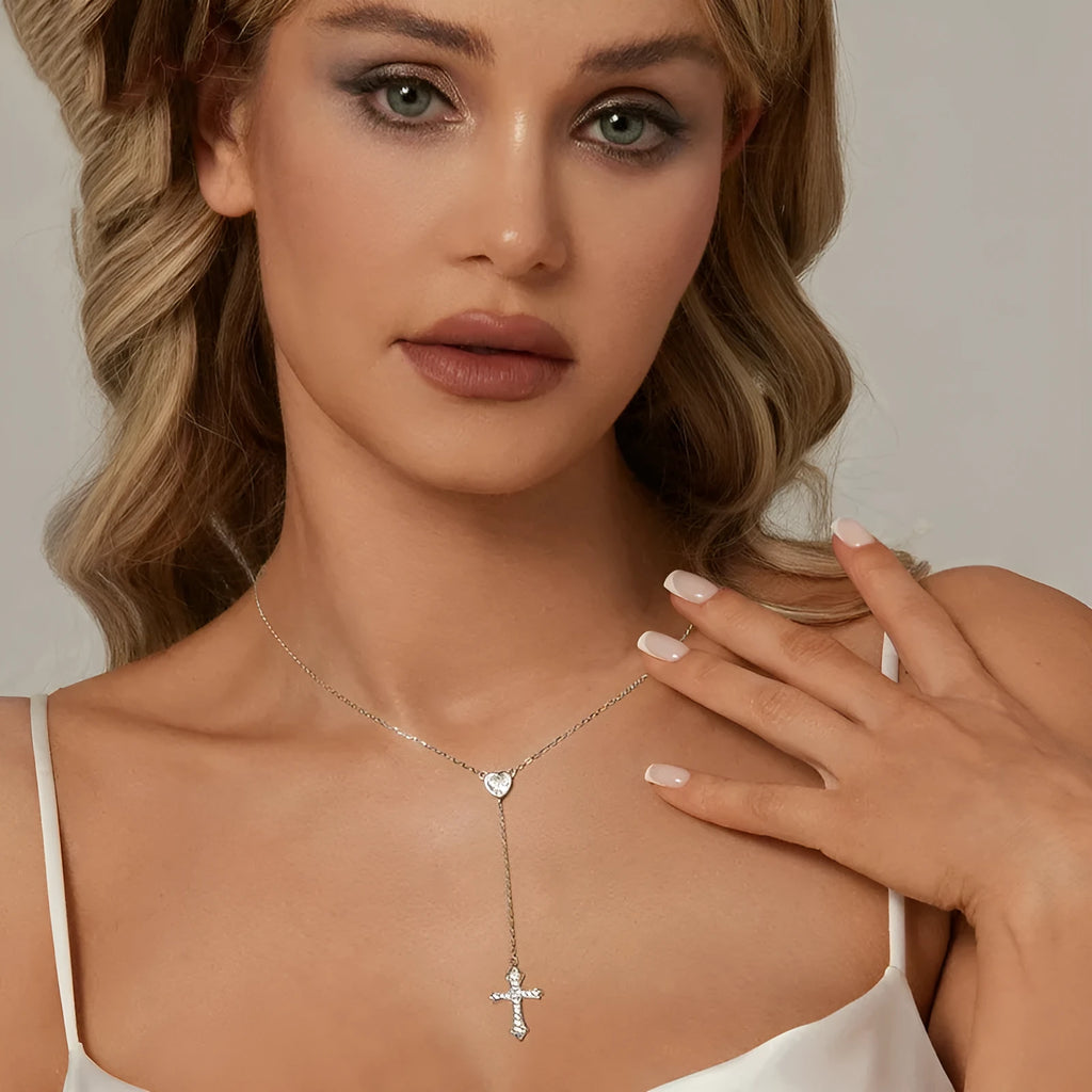 Silver love cross pendant necklace with V-neck chain on woman
