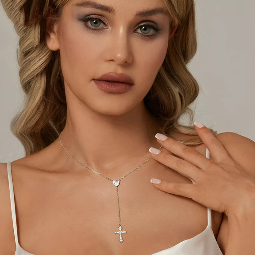 Silver love cross pendant necklace with V-neck chain on woman