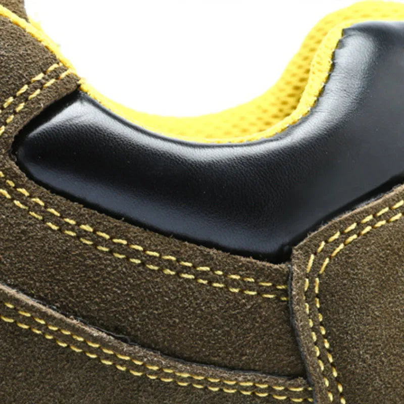 Bronze cowhide leather low-cut safety boots with a steel toe cap and solid rubber tread sole.