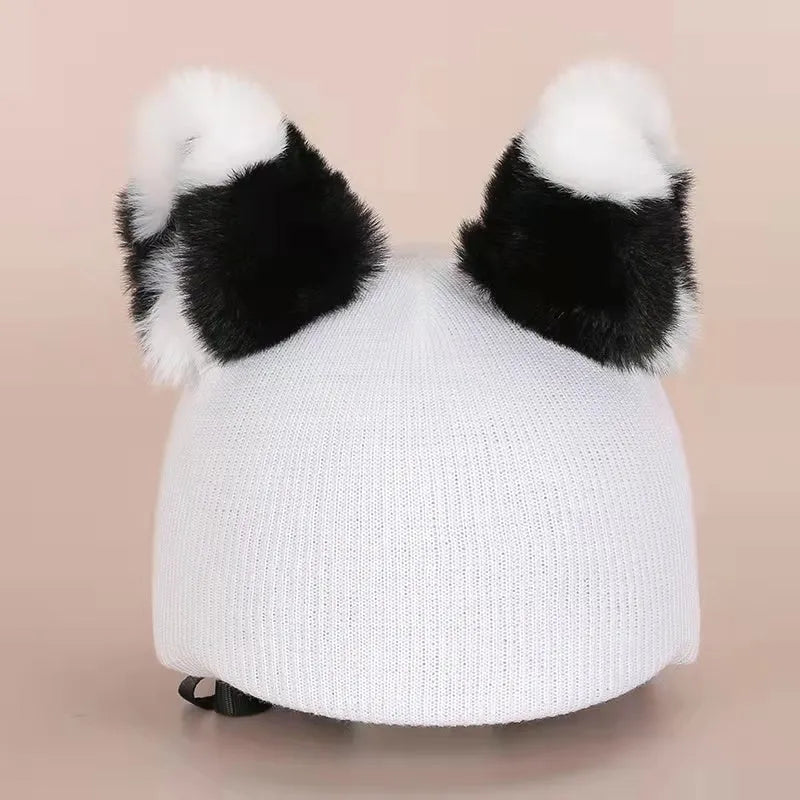 A plush fabric helmet cover with cartoon character ears, shown in size M for bicycle or motorbike use.