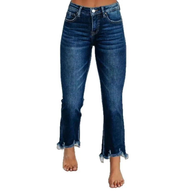 Solid colour women's denim jeans in dark blue and light blue washes, showing hand-worn detail.