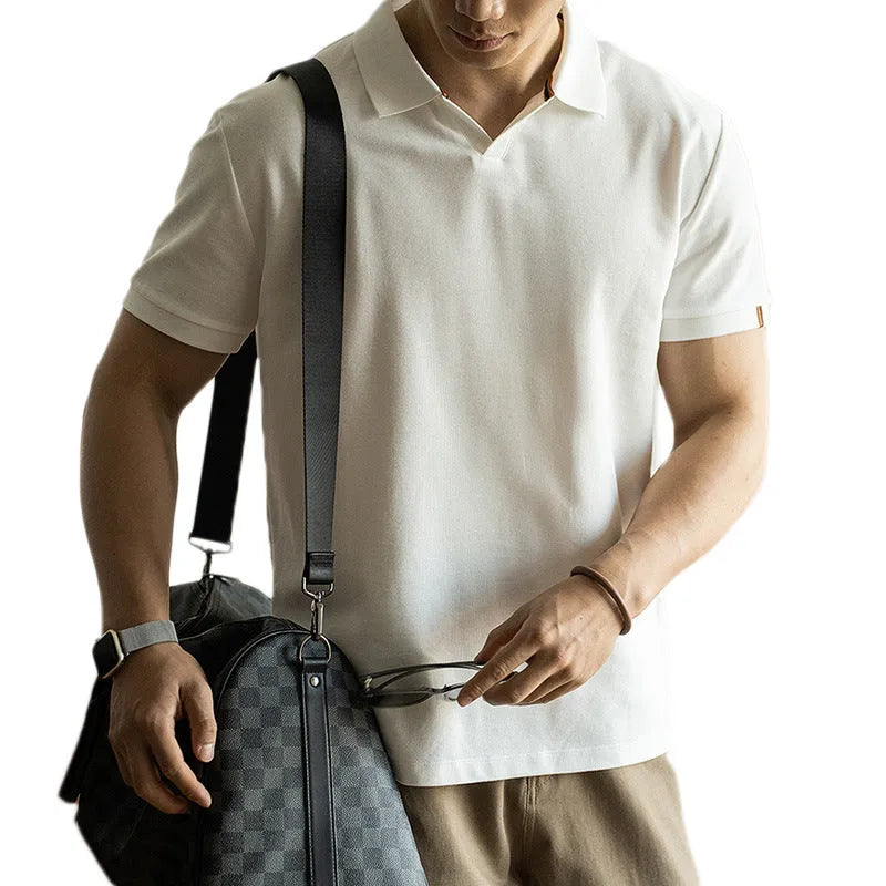 American-style short-sleeve polo shirt in blue, black, or white cotton-polyester blend.